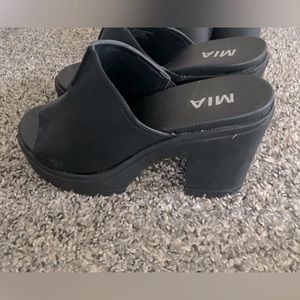 Black platform heels in size 7
